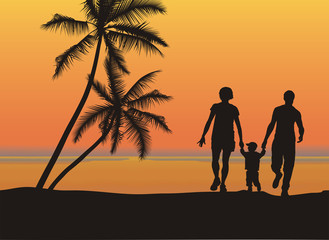 Family on the beach with the sunset