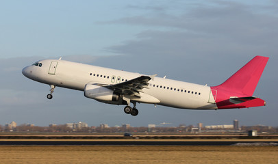 white plane takig off