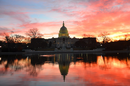 United States Capitol Building silhouette at sunrise