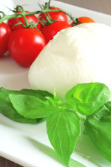 Mozzalerrla with tomatoes and basil
