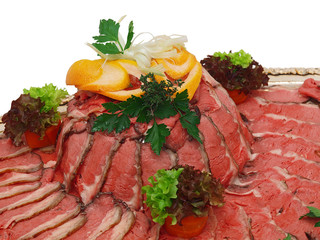 roast beef on silver platter