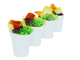 mixed leaf salad in modern high bowls