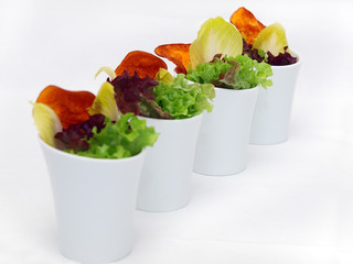mixed leaf salad in modern high bowls