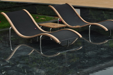 Luxury sunbeds in the pool