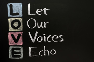LOVE acronym, Let our voices echo written in chalk