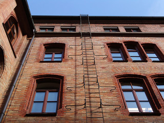 Obraz premium fire-escape ladder on an old building