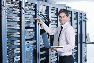 young it engeneer in datacenter server room