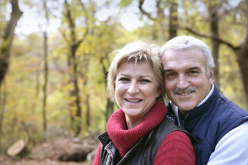 Couple strolling in the forest