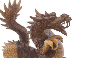 Wooden dragon, symbol of chinese new year, isolated on whitec