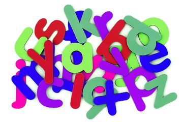 Colorful alphabet scattered on white