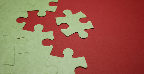 Pieces of puzzle with a red background