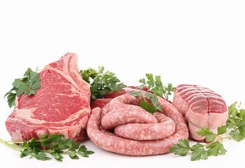 isolated raw meats and parsley on white