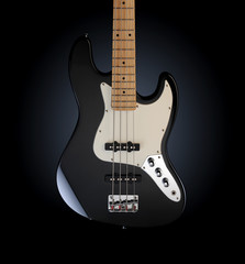 Plakat close up of a black electric bass glossy on dark background