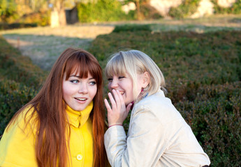 Fototapeta premium portrait of two teenage girls outdoors