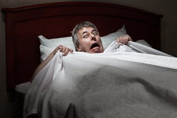 Man startled awake by intruder