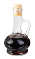 Small decanter with balsamico vinegar  isolated on the  white