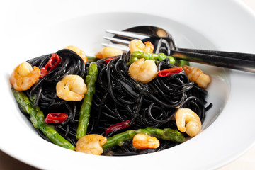 sepia spaghetti with prawns, asparagus and chilli