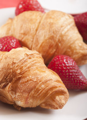 croissants close up with strawberry
