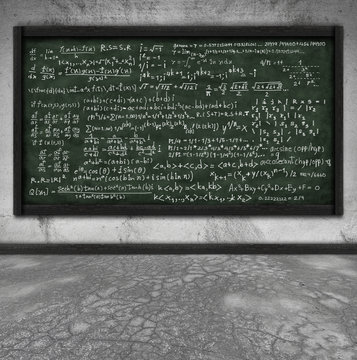 maths formula on chalkboard in classroom