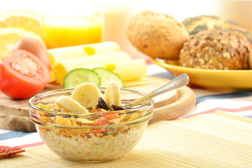 Breakfast including rolls, egg, cheese, coffee and orange juice