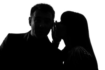 one couple man and woman whispering at ear - 37900403