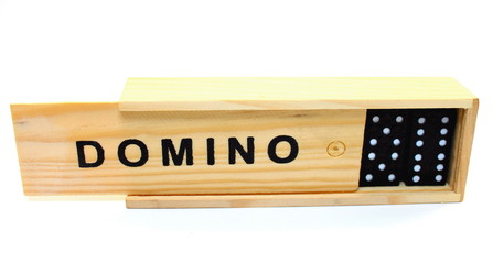 A box with dominoes on white background