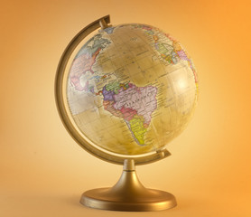 globe on yellow © litvinchuk