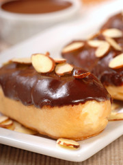Delicious chocolate eclairs with almonds