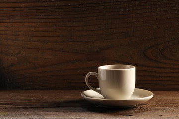 cup of coffee on the wooden table