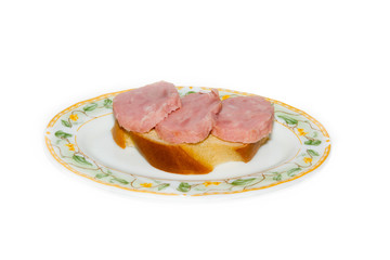 club sandwiches with ham and cheese on a plate close-up