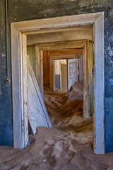 an house overtaken by dune sand at kolmanskop near luderitz