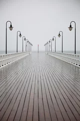 Foto op Canvas old pier in rain on Baltic sea Orlowo Gdynia Poland © anetlanda