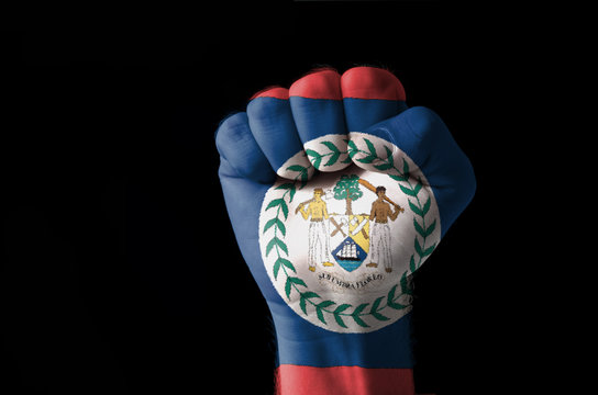Fist painted in colors of belize flag
