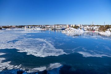 Quay port covered with ice.