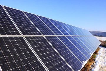 Solar Power Station in the snowy winter Nature