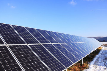 Solar Power Station in the snowy winter Nature
