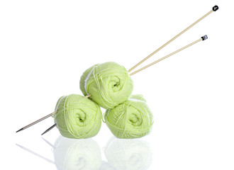 yellow green knitting yarn with needles