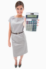 Woman showing hand calculator