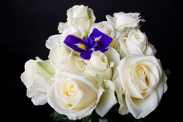 Bouquet of white roses with iris