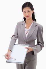 Businesswoman asking for signature