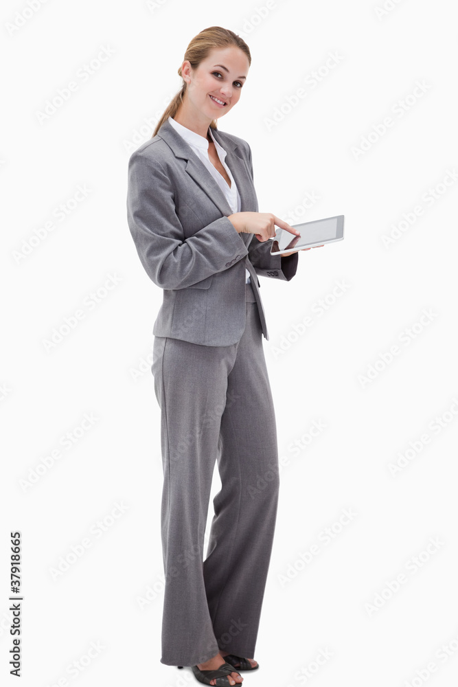Poster side view of smiling bank employee using tablet