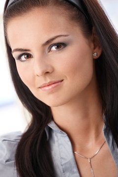 Closeup portrait of young woman smiling