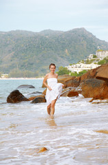 girl running in waves