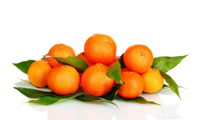 Ripe tasty tangerines with leaves isolated on white