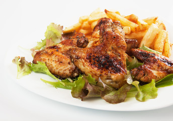 Grilled chicken wings with french fries