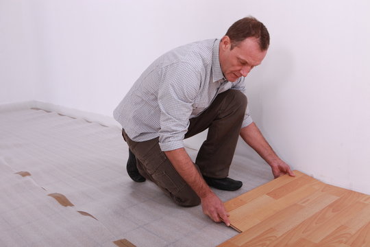 portrait of a man laying parquet