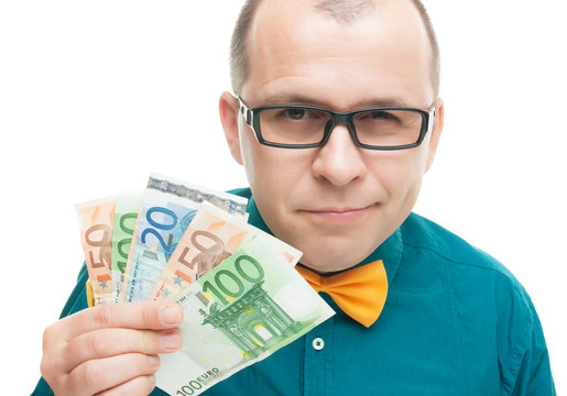 Smiling man with european money