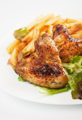 Grilled chicken wings with french fries