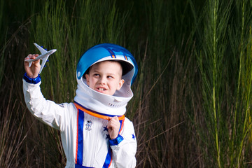child playing with toy airplane