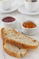 bread with jam in bowls